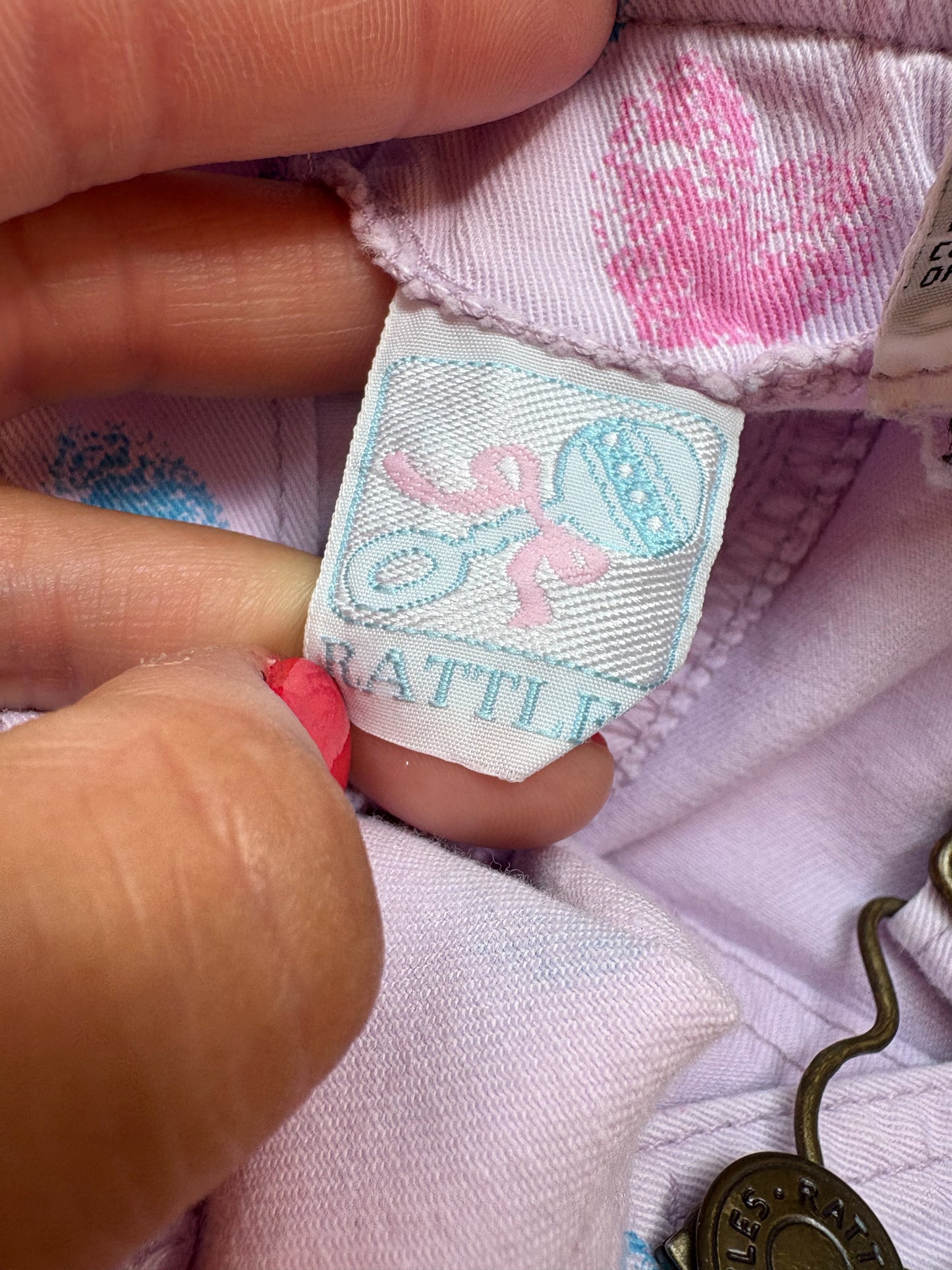 Vintage Rattle AOP baby overalls.