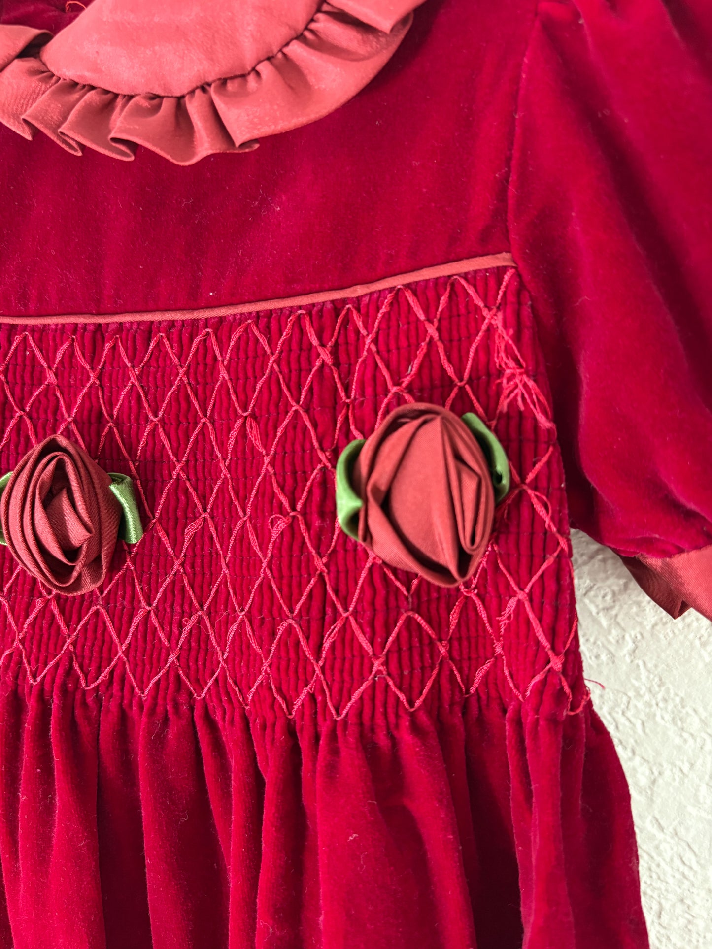 Unbranded vintage smocked velvet toddler dress.