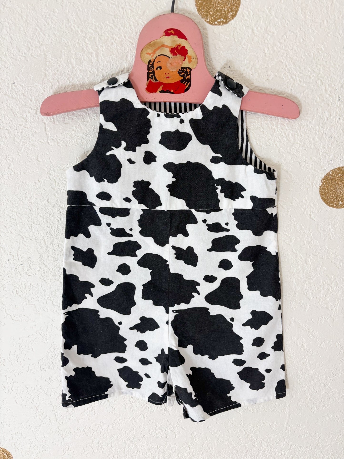 Homemade cow baby romper.
