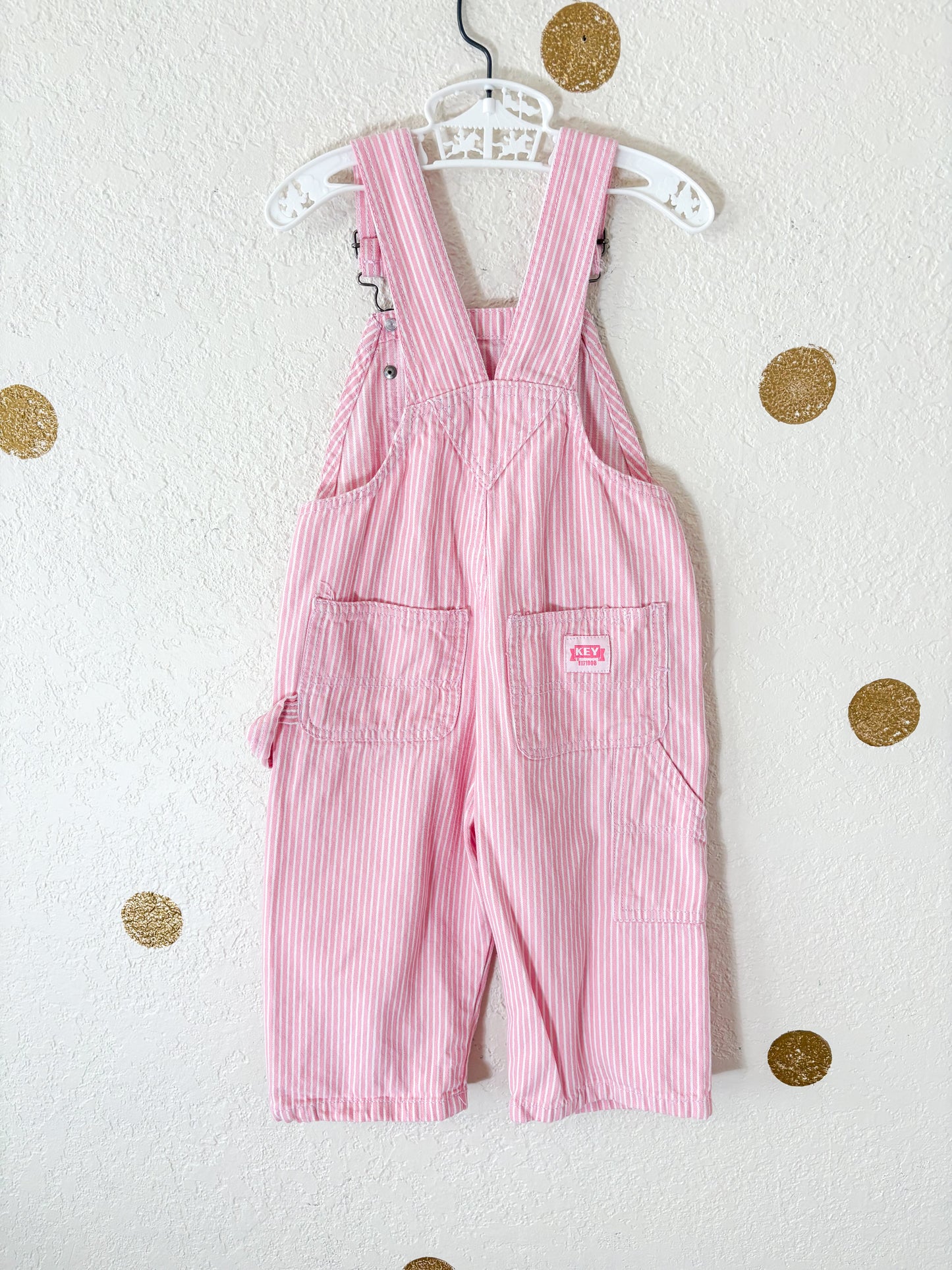 Modern Key striped toddler overalls.