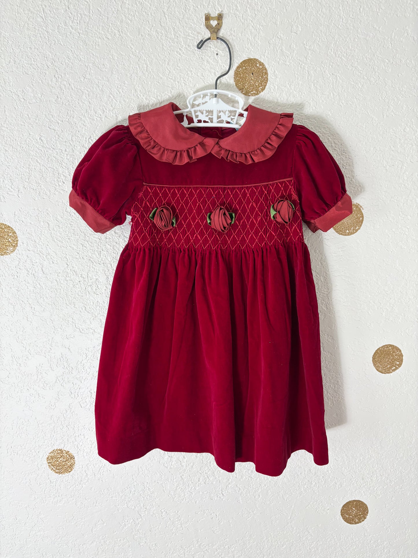 Unbranded vintage smocked velvet toddler dress.