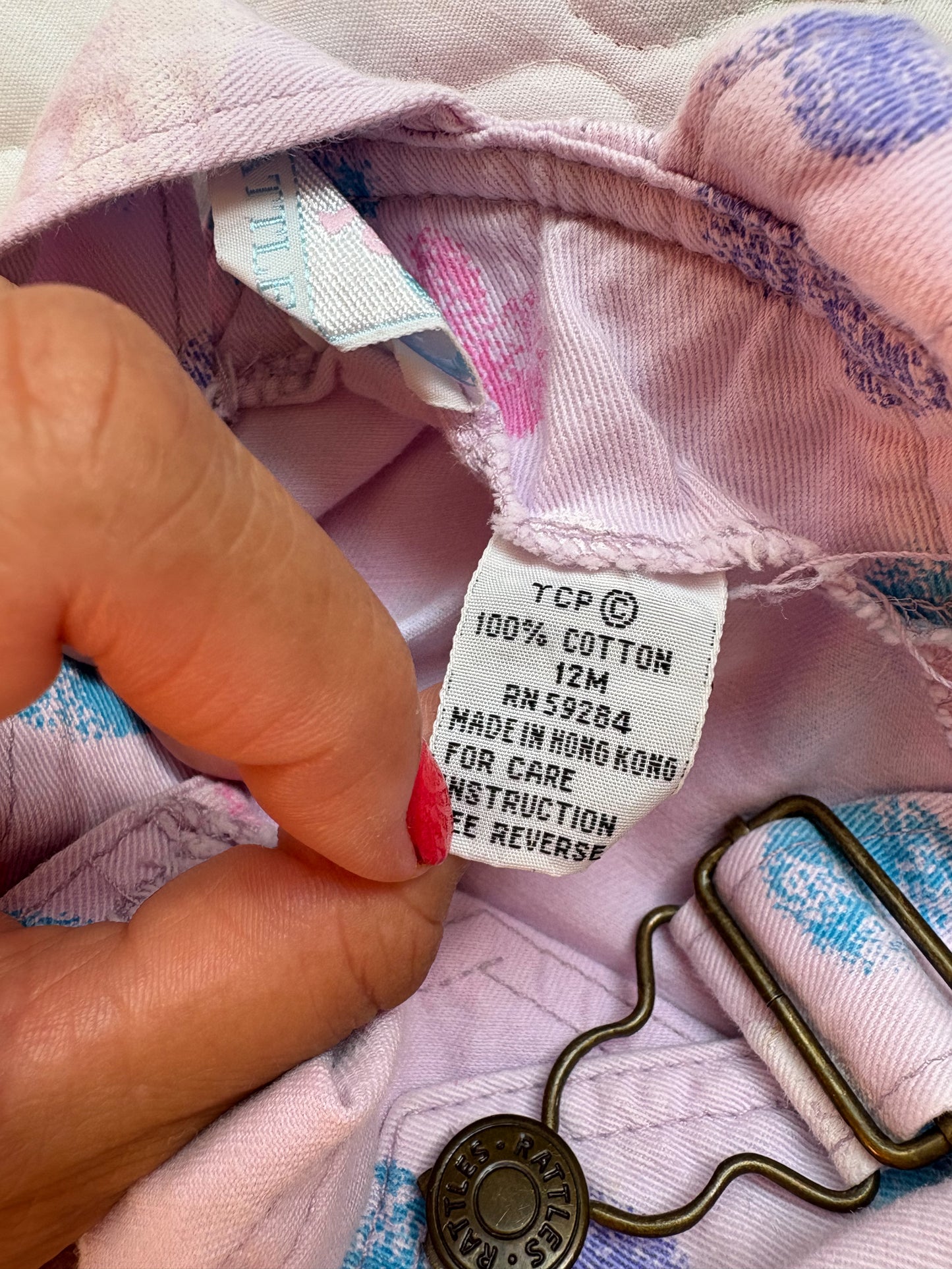 Vintage Rattle AOP baby overalls.