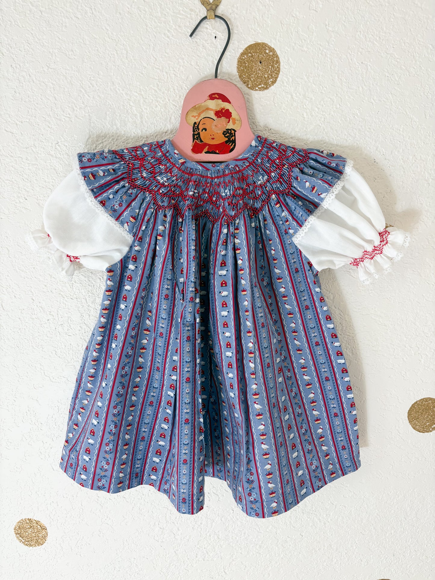 Homemade vintage smocked baby dress.