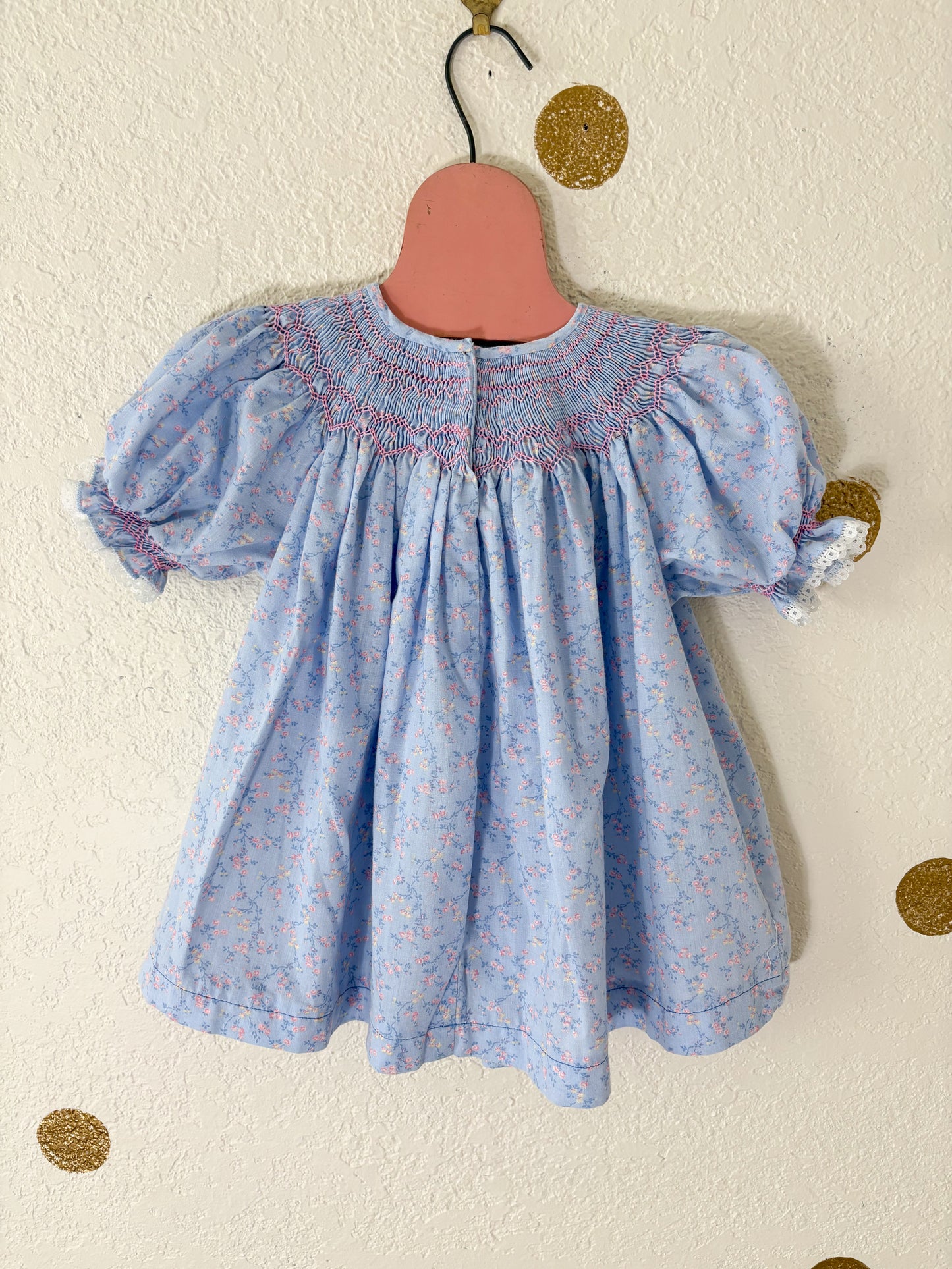 Homemade vintage smocked dainty floral baby dress.