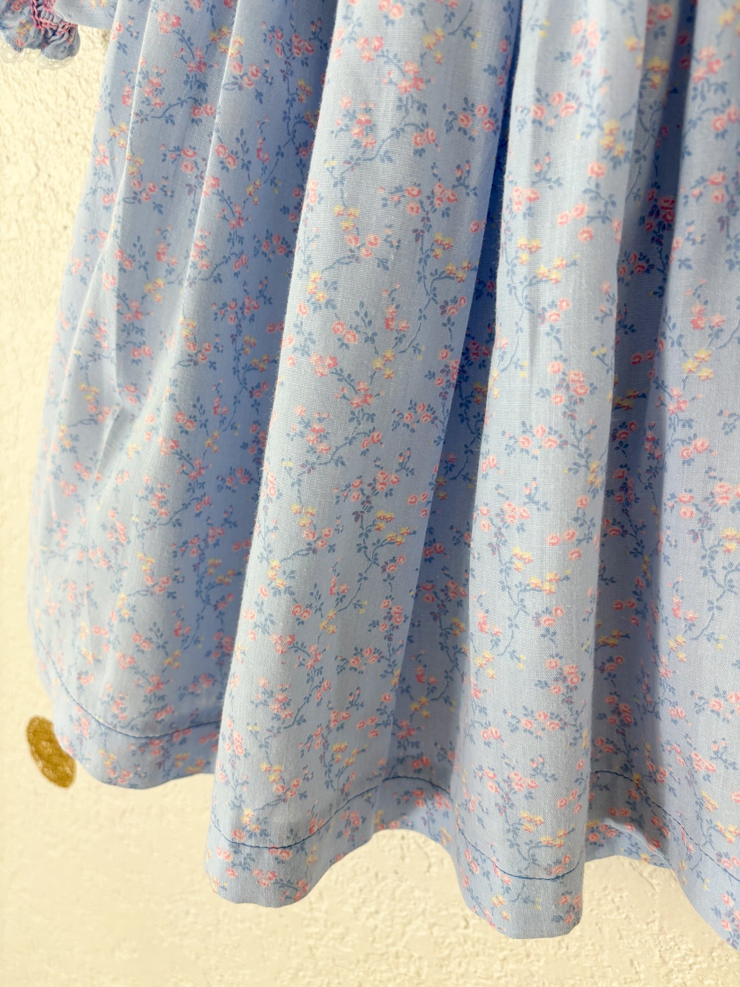 Homemade vintage smocked dainty floral baby dress.