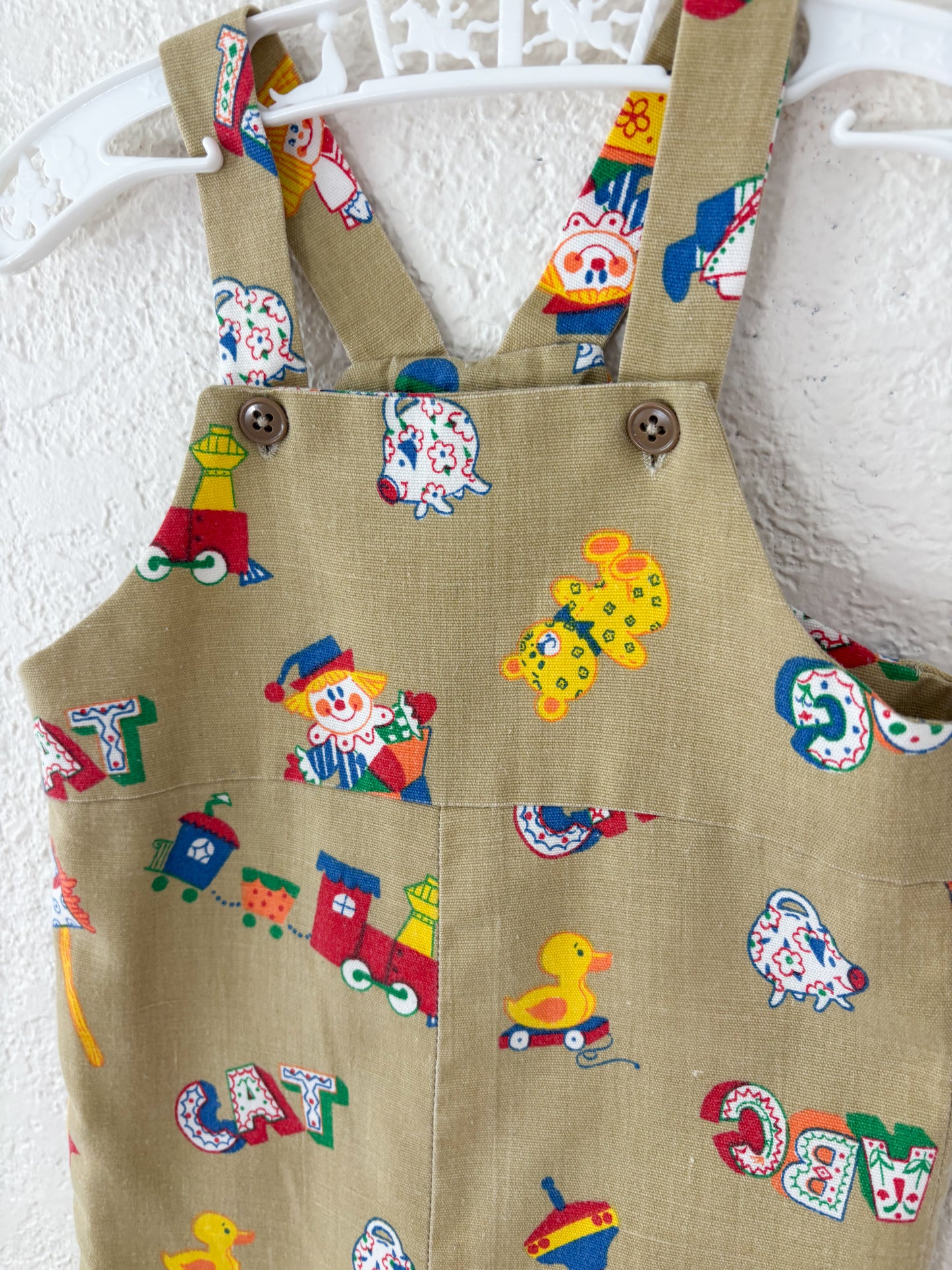 Homemade vintage GN baby romper.