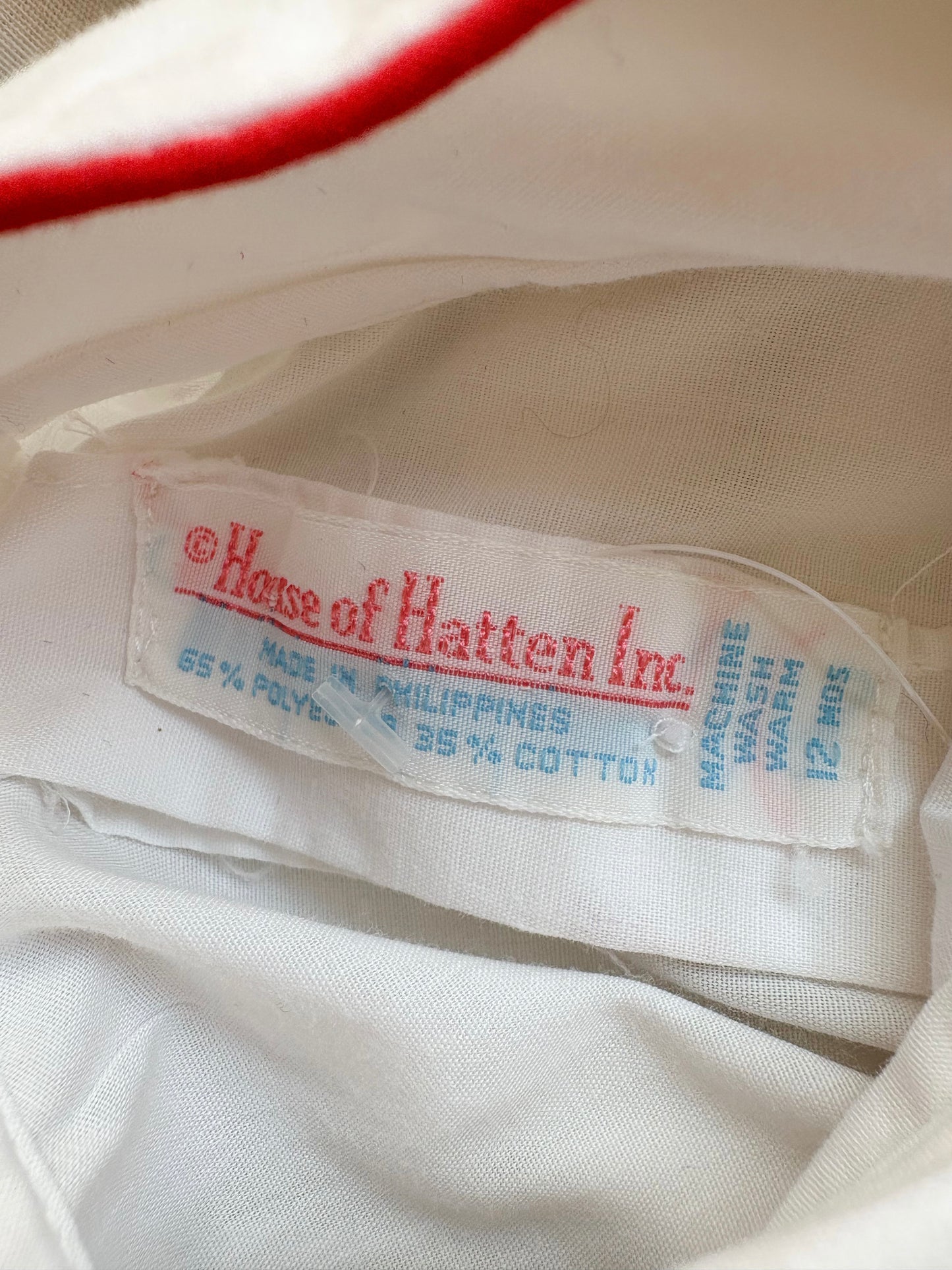 Vintage House of Hatten smocked baby dress.