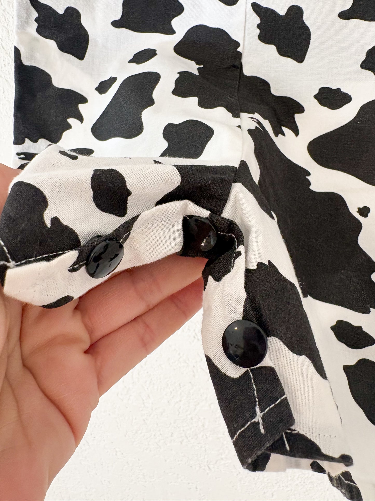 Homemade cow baby romper.