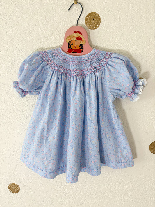 Homemade vintage smocked dainty floral baby dress.