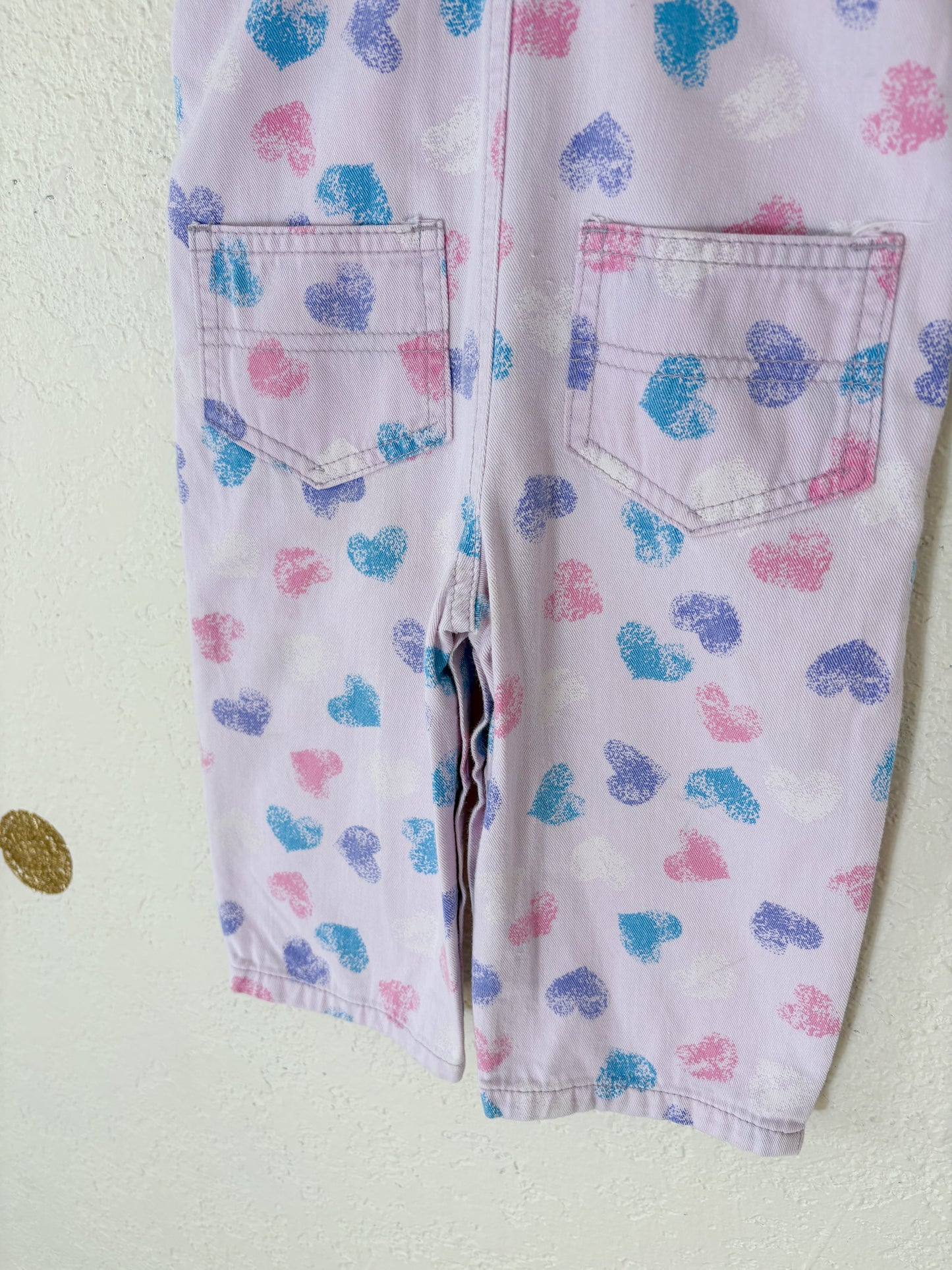 Vintage Rattle AOP baby overalls.