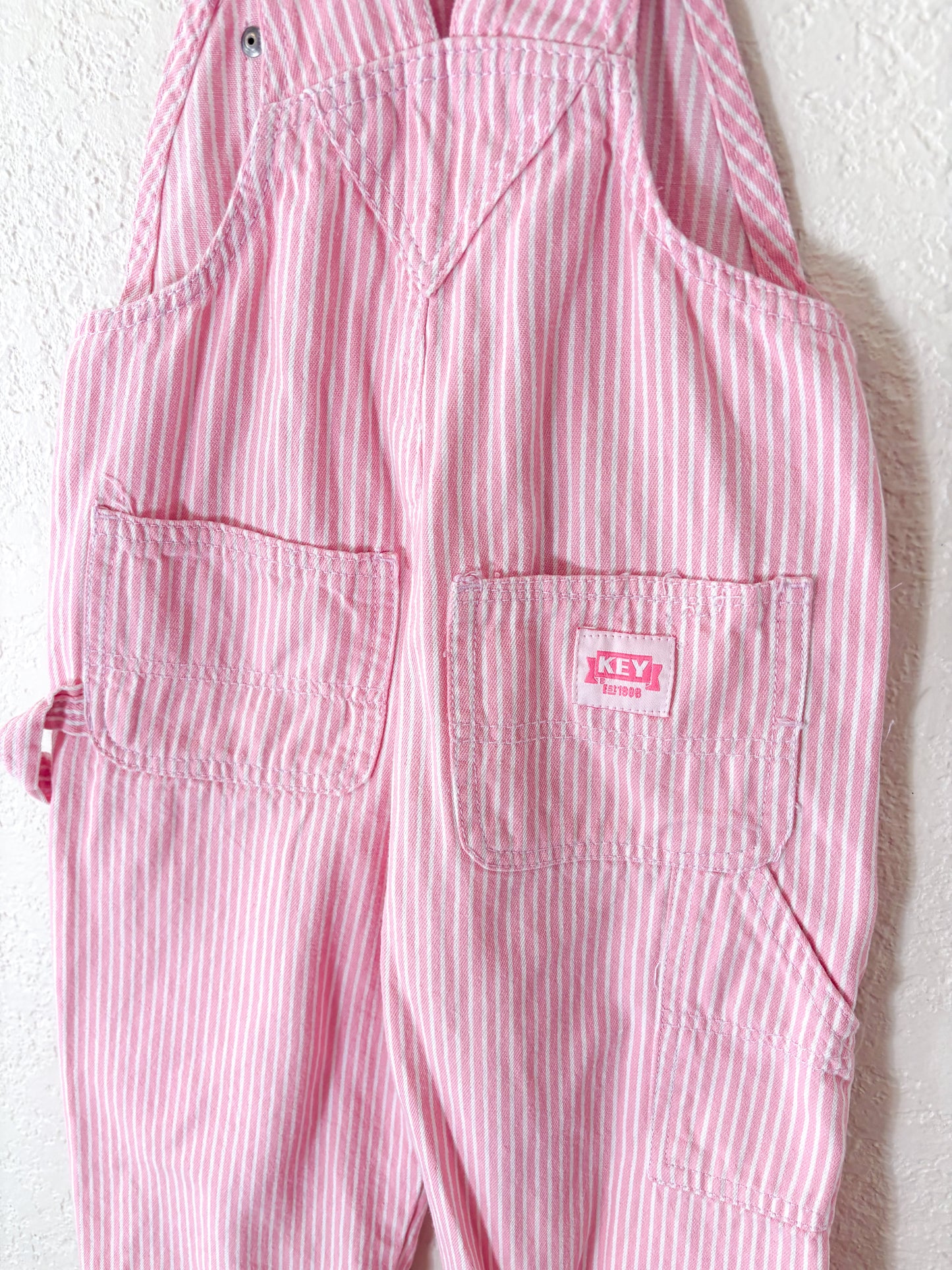 Modern Key striped toddler overalls.