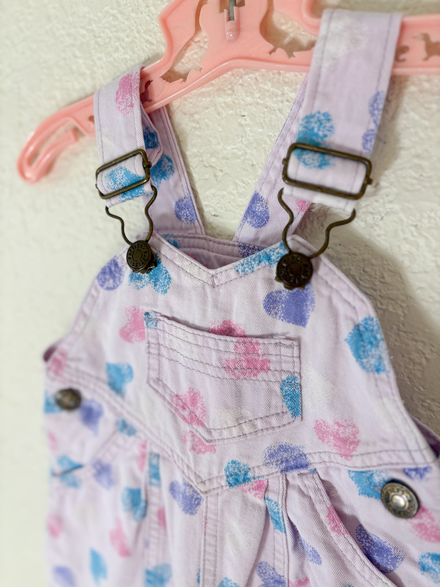 Vintage Rattle AOP baby overalls.