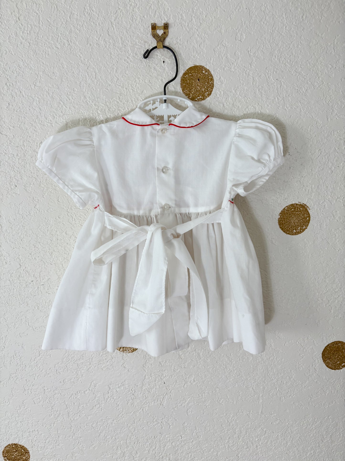 Vintage House of Hatten smocked baby dress.