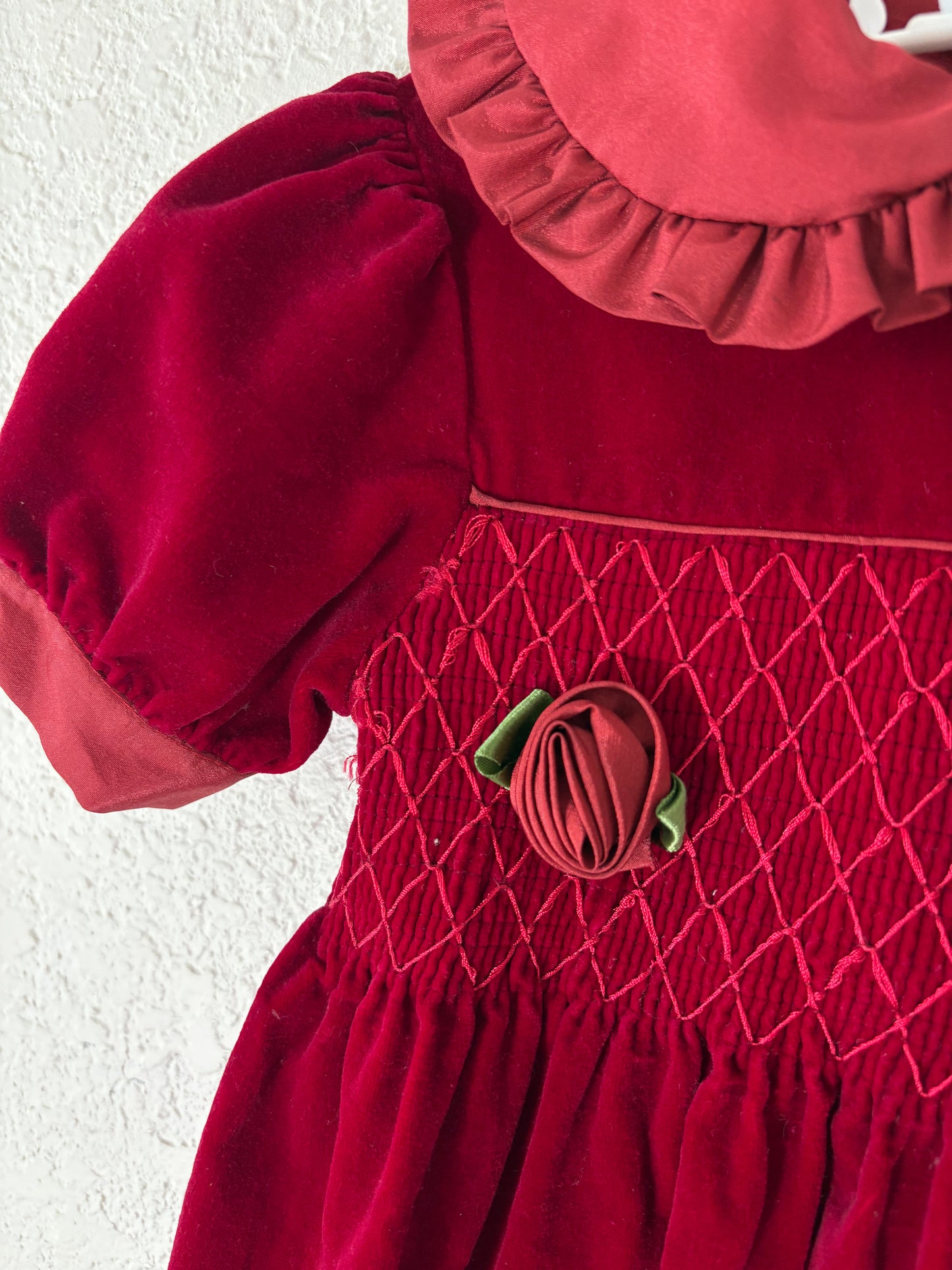 Unbranded vintage smocked velvet toddler dress.