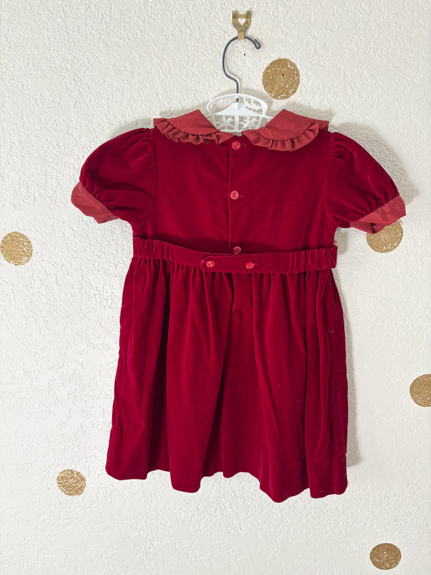 Unbranded vintage smocked velvet toddler dress.