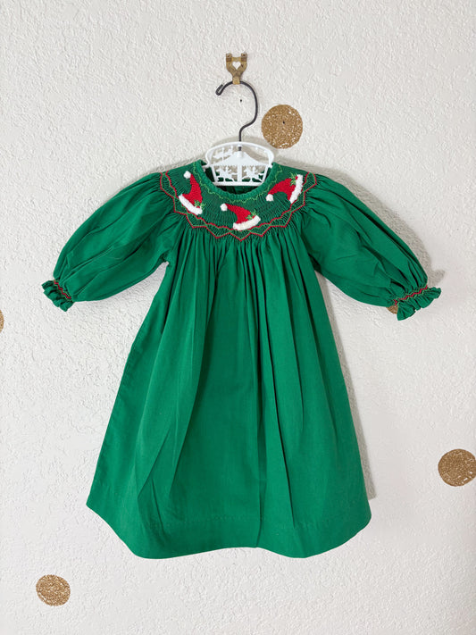 Boutique Mom & Me smocked baby dress.