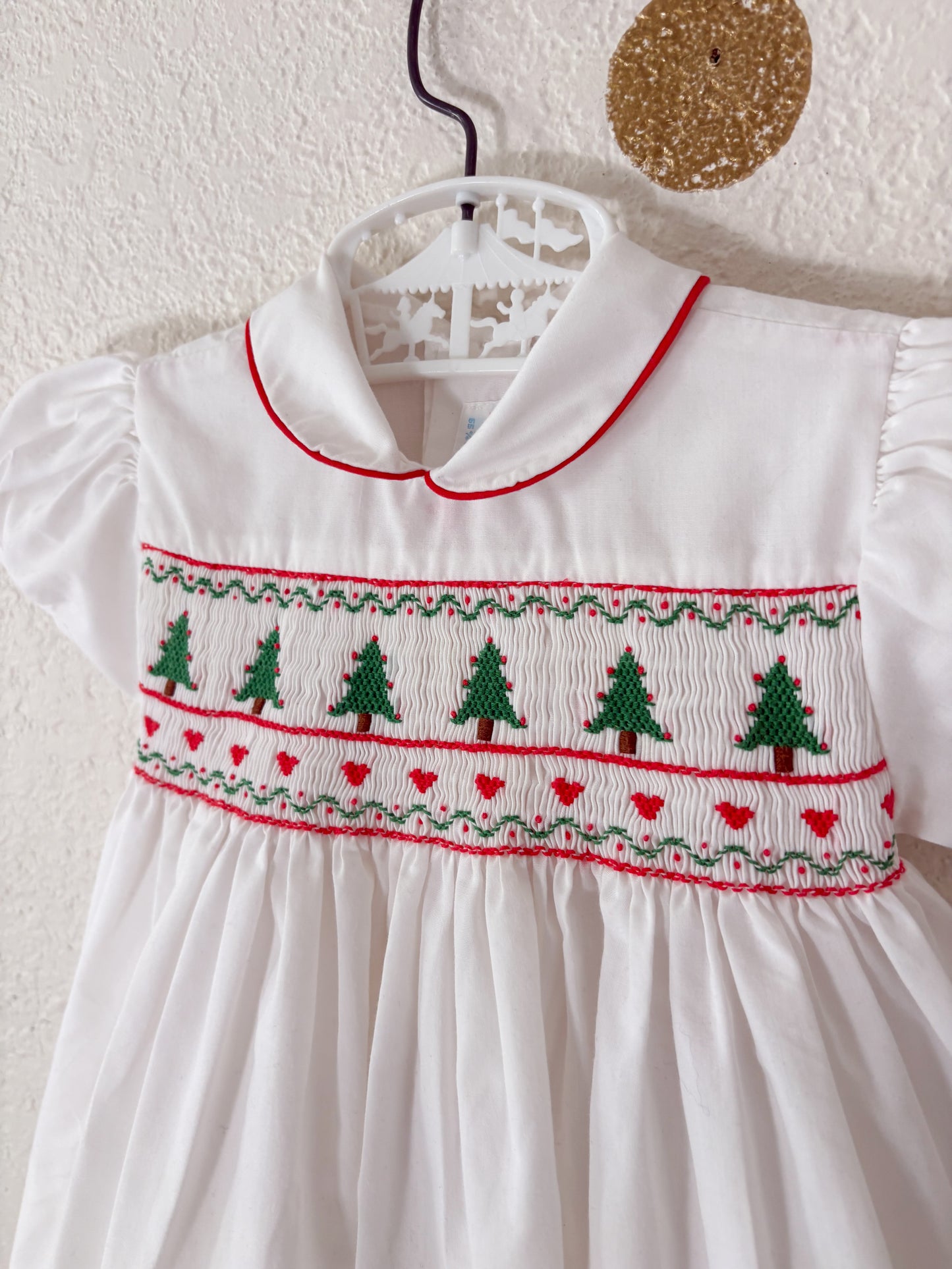 Vintage House of Hatten smocked baby dress.