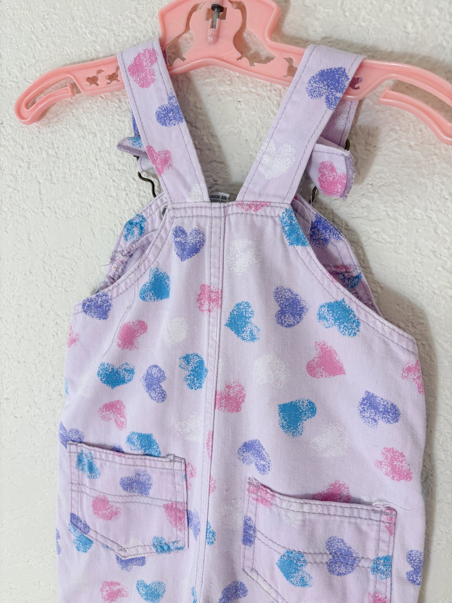 Vintage Rattle AOP baby overalls.