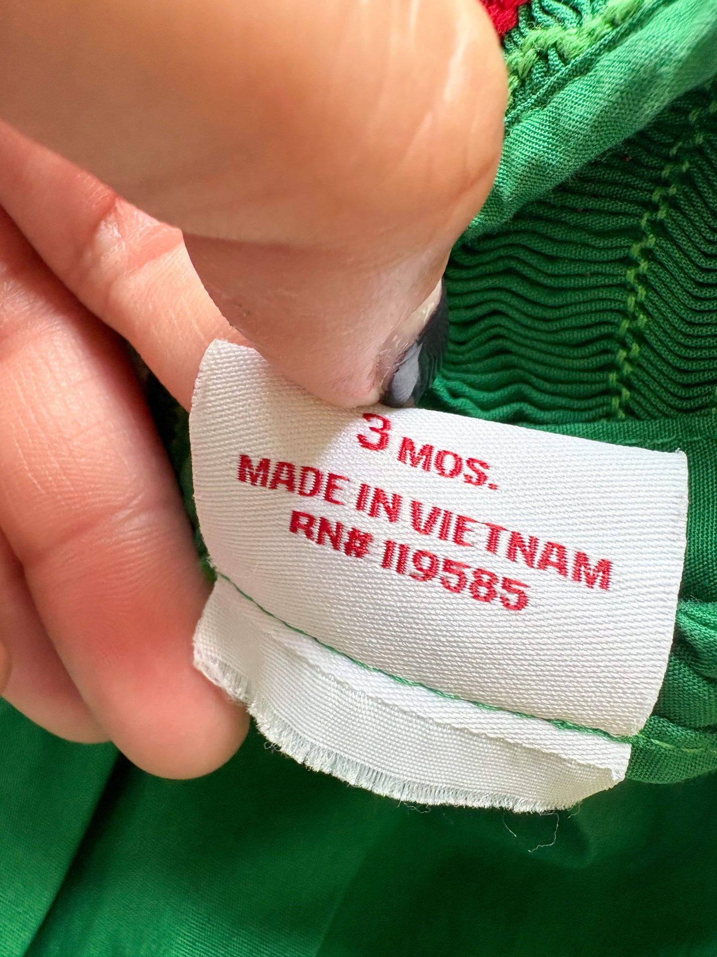 Boutique Mom & Me smocked baby dress.