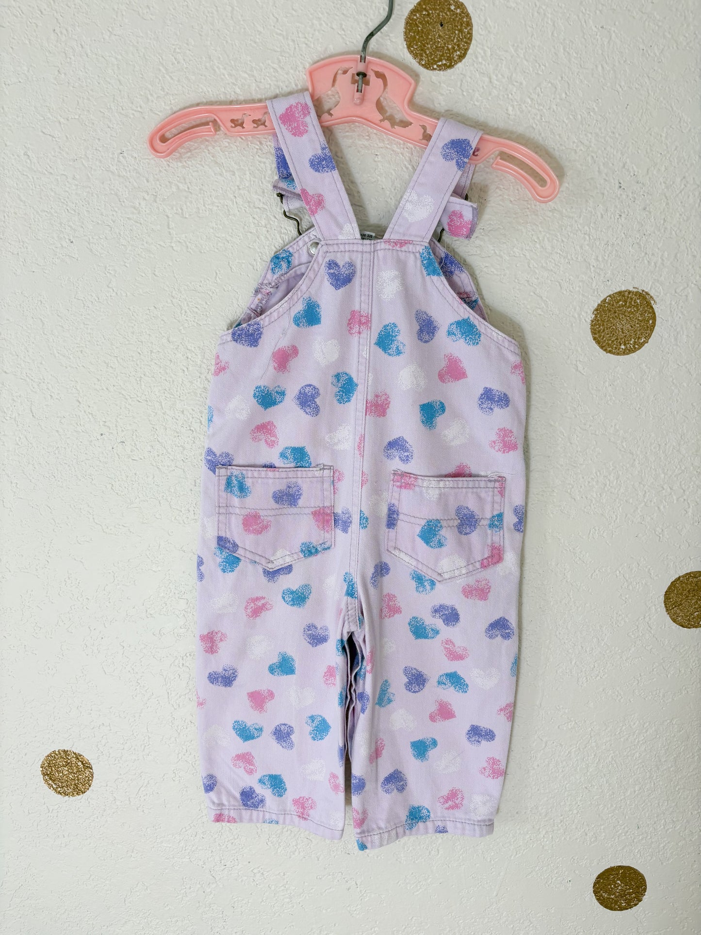 Vintage Rattle AOP baby overalls.