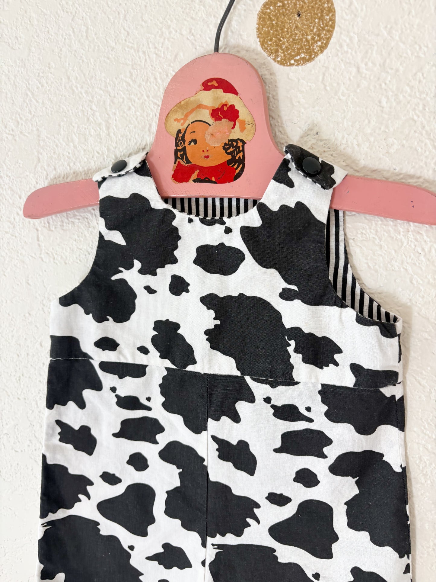 Homemade cow baby romper.