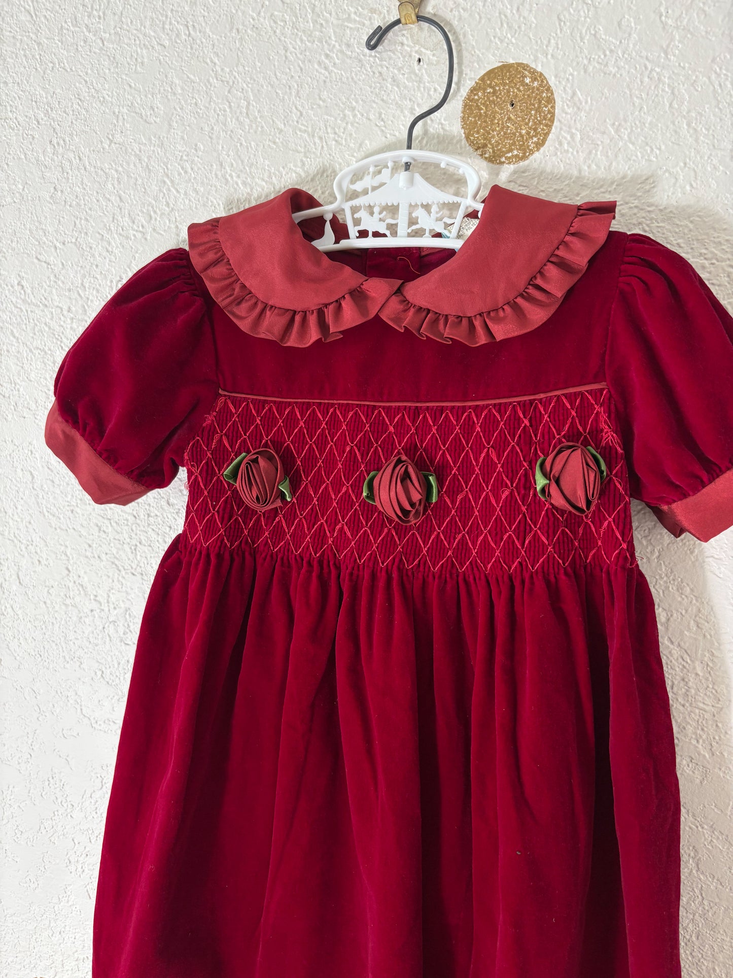 Unbranded vintage smocked velvet toddler dress.